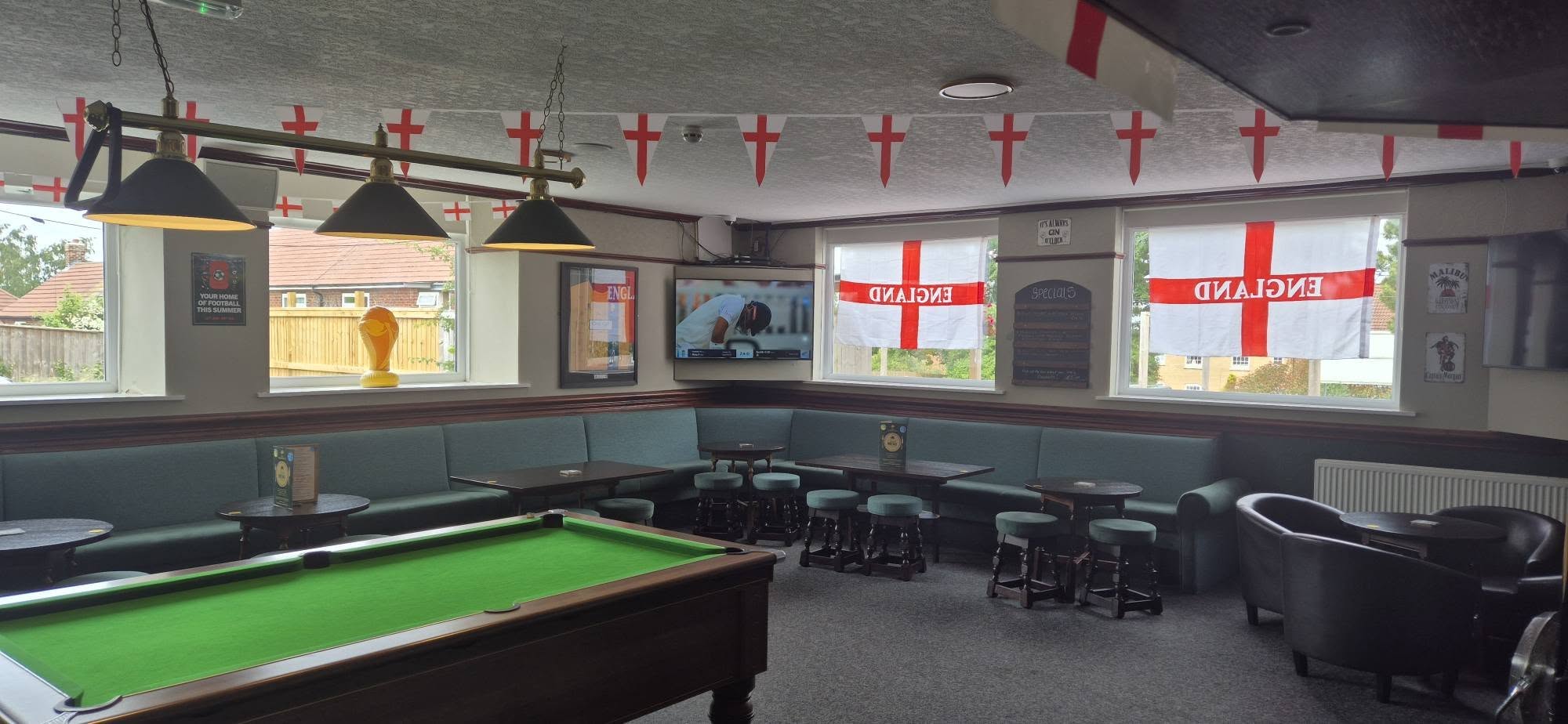 The Sherwood pub warm inviting interior with wooden furniture and cozy atmosphere